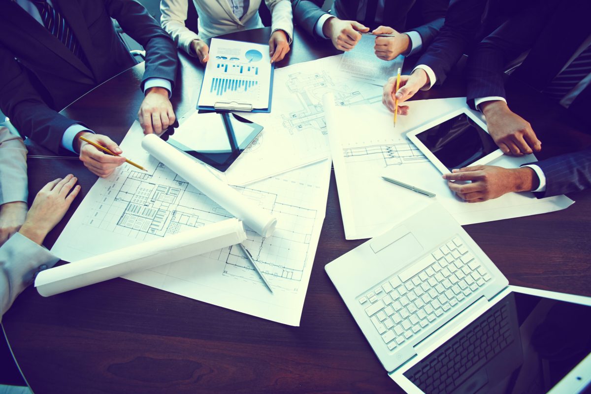 Image of human hands during paperwork at meeting